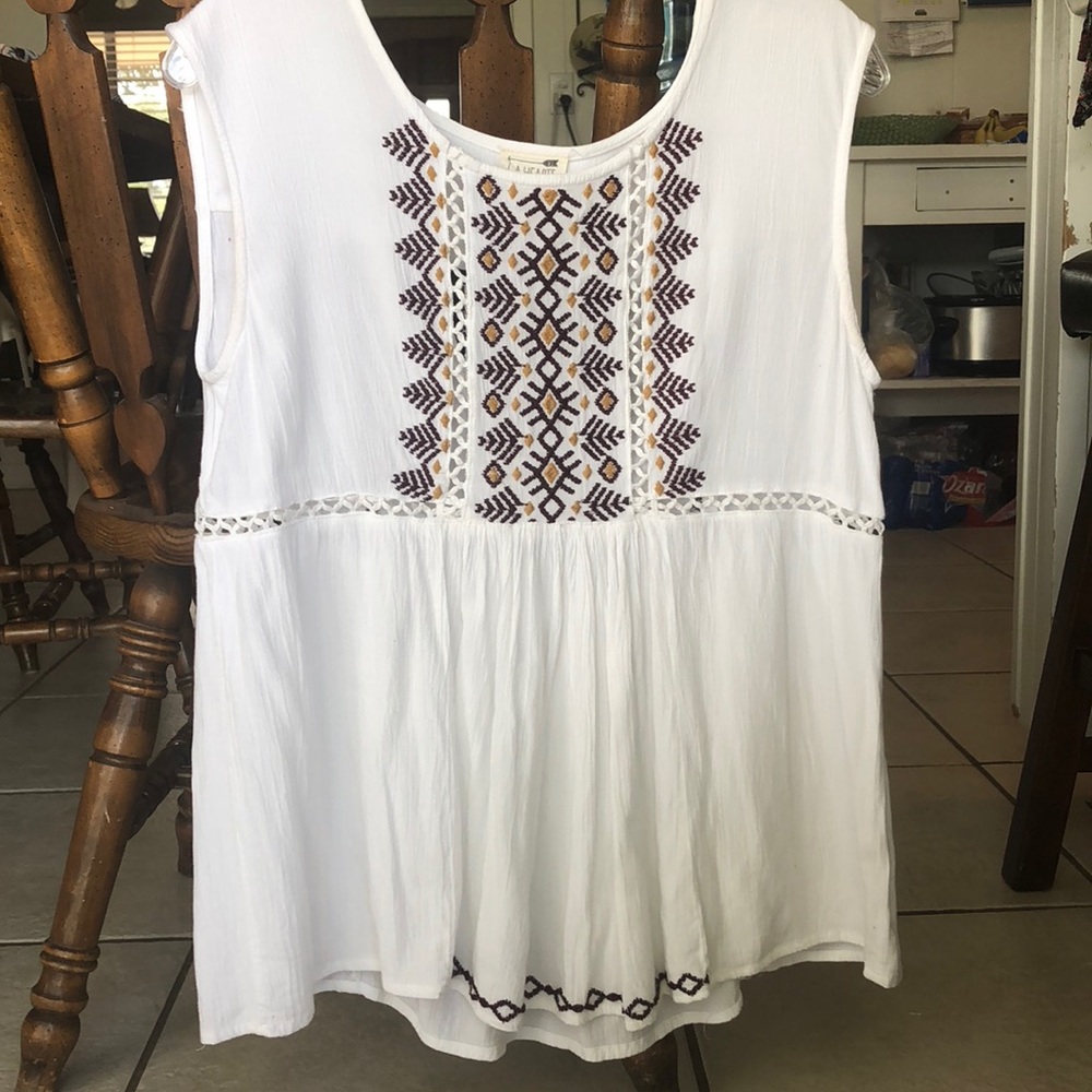 White tank top with embroidery detail
